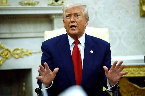 U.S. President Donald Trump responds to a reporter’s question during a meeting in the Oval Office of the White House on April 7, 2025, in Washington, DC. Photo by Kevin Dietsch/Getty Images