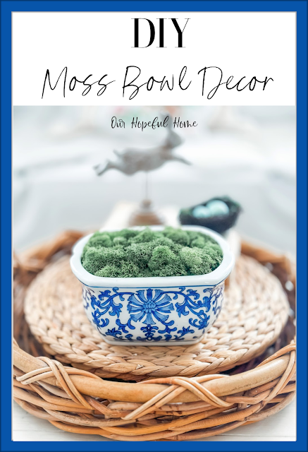 chinoiserie bowl filled with preserved moss on spring coffee table