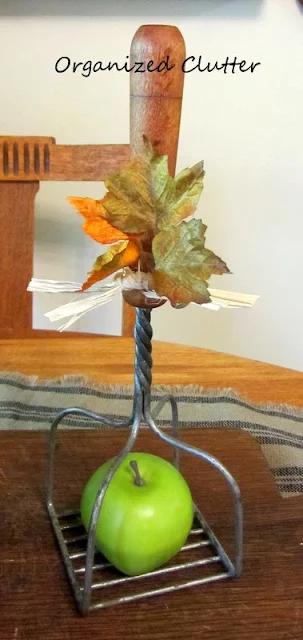 Repurposing a vintage potato masher as a wire cloche