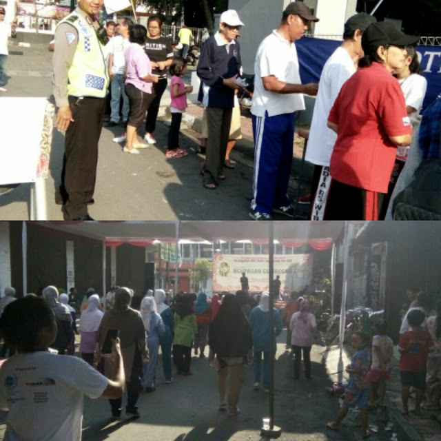 Polsek Gondomanan Kawal Jalan Sehat Hut Kota Yogyakarta ke 260 Kelurahan Ngupasan