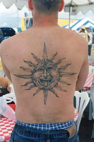 Interlaced flames sun. Tribal Tattoos tattoo pictures