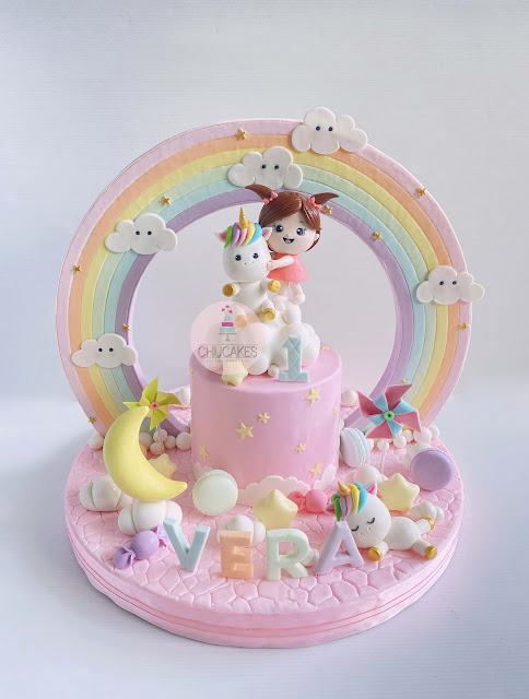 Fondant cake little girl unicorn unicorns little girl rainbow clouds stars moon macaron pinwheel chucakes cloud
