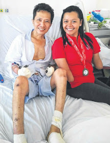 SHOWING THE WAY: When Mr Tan saw Ms Aishah enter his ward, he was moved to tears. His hands and feet have to be amputated.