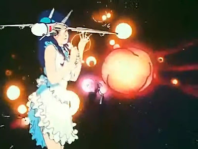 Minmay sings during the closing battle. This scene works pretty well in both versions.