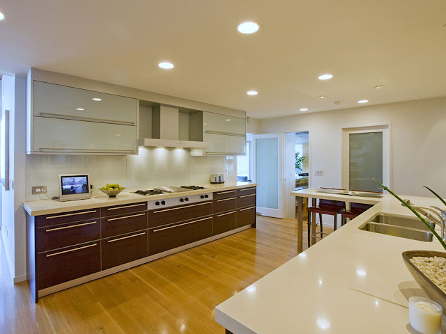 Picture of modern brown and white kitchen furniture in modern mansion