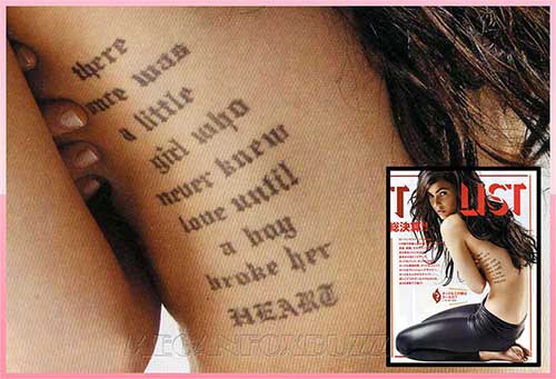female rib tattoos. on the spine,2 other black