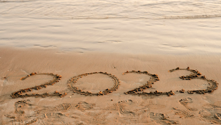 2023 written in beach sand