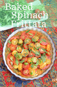 Food Lust People Love: This tomato salad topped baked spinach frittata is a delicious combination of richness from the eggs, ham and cheese and the sharp sweetness of the tomatoes with herbs. It makes a wonderful brunch, lunch or dinner dish!