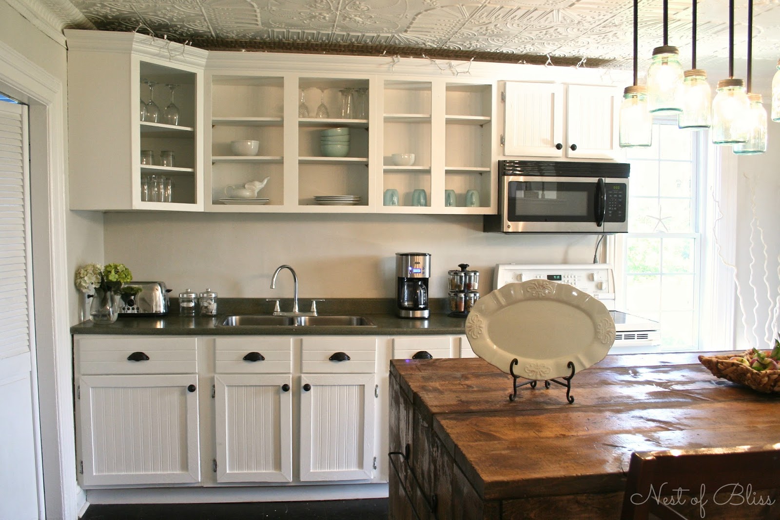 Budget Cabinet Makeover - Sand and Sisal  White Country Kitchen with budget cabinet makeover tutorial