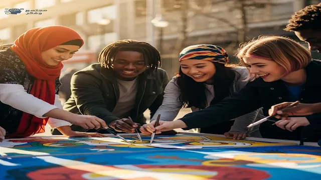 صورة لمجموعة من الشباب من خلفيات متنوعة يعملون معًا بحماس في مشروع مجتمعي أو يشاركون في نشاط سلمي يهدف للتغيير، ترمز إلى دور الشباب في تحقيق التغيير الاجتماعي.