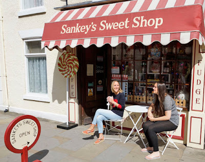 Natalie Sankey, left, outside her sweet shop on Brigg Horse Fair Day 2016 - picture on Nigel Fisher's Brigg Blog