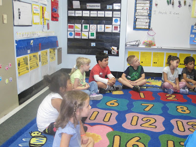 boys and girls learning about recycking