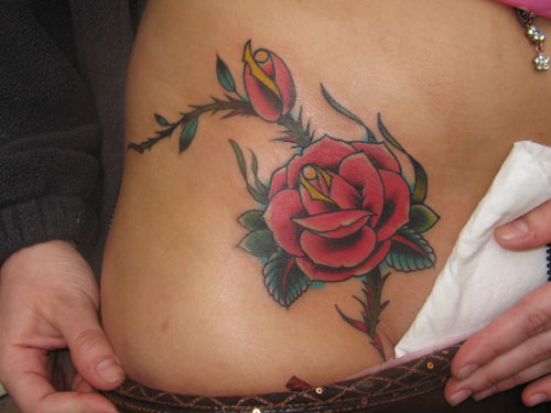 Floral Tattoos · Hip Tattoos · The Body Art Corner. Pink Water Lily Tattoo