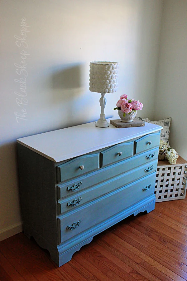 The new color on the dresser will work wonderfully for either a nursery or an adult space.