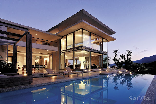 Picture of the house as seen from the pool area at sunset