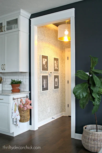 blue floral wallpaper hallway