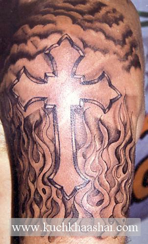 Cross Tattoo Arm. famous tribal cross tattoo