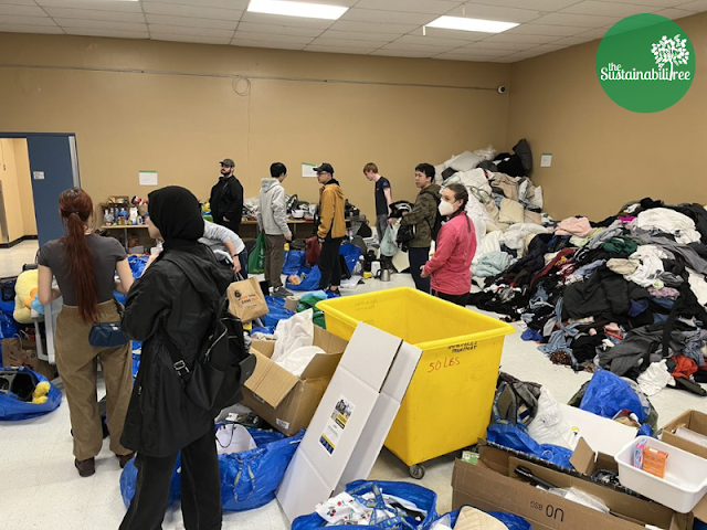 uOttawa student volunteers sorting piles of donations into categories at the Dump and Run