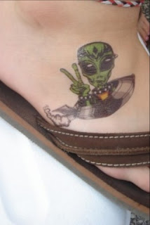 Alien Tattoo Design Picture gallery - Alien Tattoo Ideas