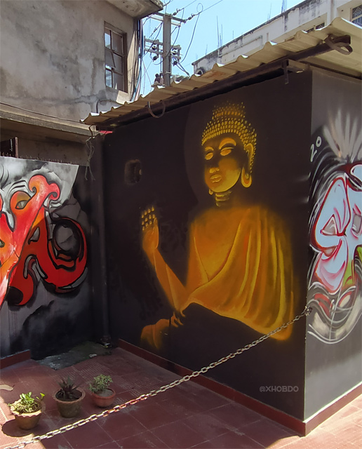 Wall graffiti of Lord Buddha