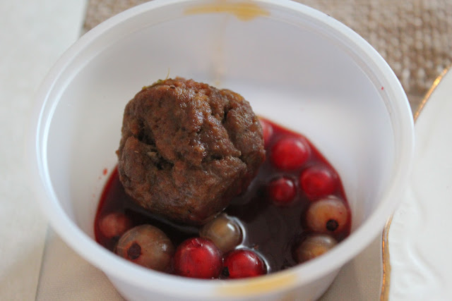 Duck and lamb sausage meatball with red currant sauce