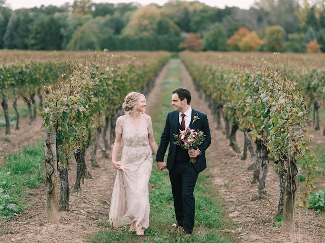 Niagara wedding planner | A Divine Affair | Sharon and Jurek . Photographer Calvin Frank. Wedding ceremony at Kurtz Orchards Gracewood Estates. Reception at Kurtz Orchards Marketplace. October harvest wedding decor. tented wedding. white pumpkins, live band