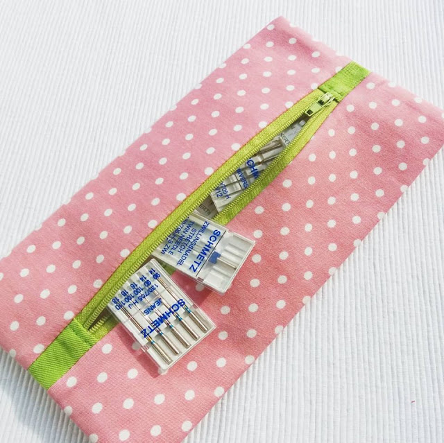 Learn how to make a small zippered pouch for sewing notions - flat and with a centred zip. Tutorial by Apple Green Cottage