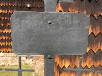 Closeup of plate with names engraved.