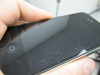 iPhone with scratches on the screen