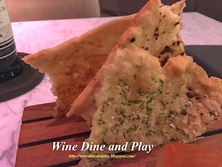 Dill, garlic, and cheese flatbreads at Pierre's Bistro in Dubai