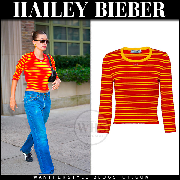 Hailey Bieber in orange striped top and jeans