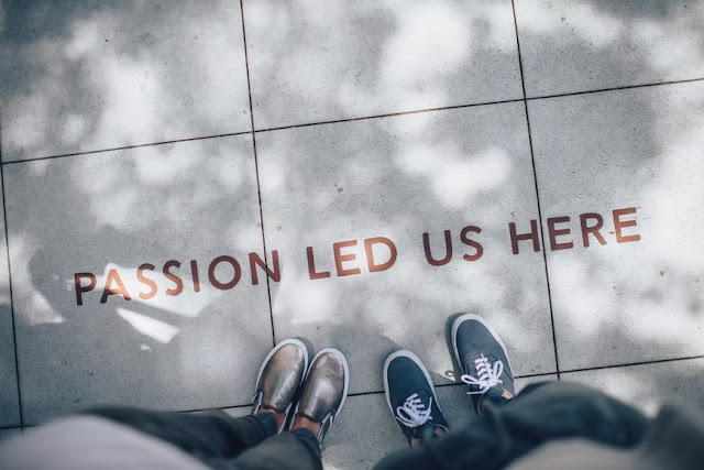 “Passion led us here,” engraved on the sidewalk
