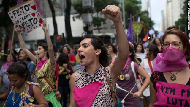     Women protesting violence against women in Rio de Janeiro, Brazil, on November 28, 2017.   “Brazil, an American country is now known for its violence  and hatred against females.”   (GYL)- According to a new study released on Tuesday, September 2019, by non-governmental organization Brazilian Forum of Public Security, which found that violence against women and girls is worsening in the country.   In Brazil, four girls under 13 are raped every hour and every two minutes police receive a report of violence against women.   Presently, Brazil which is known as the living place of over 200 million people has been labeled as one of the most dangerous place for any woman to be.   The report shows that the murder of women for just being a woman increased by 4% last year on the previous year, even as the national homicide rate fell 10.8%. In 88% of those cases, the perpetrator was the woman's partner or former partner.                                  models portraying women who have been abused at a demonstration opposing violence against women on Copacabana beach in 2016.    Over 263,000 women suffered serious injuries at the hands of their partner, according   to the study, which was based on governmental data.   The country also saw the largest ever number of reported rapes, and almost 54% of the victims were girls under 13 years old.