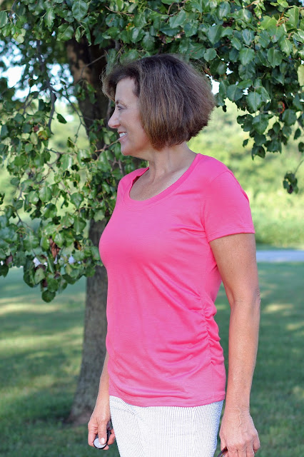 The Confident Stitch Rayon Lycra Coral knit made into Angela Wolf's Ruched T side view with ruching