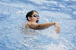 A boy enjoying swimming in the Swimming Pool