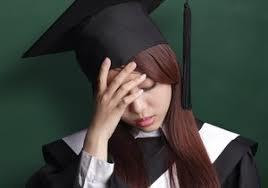 A woman in an academic graduation dress and hat, says you do not need to have a Bachelor's degree to start MBA.