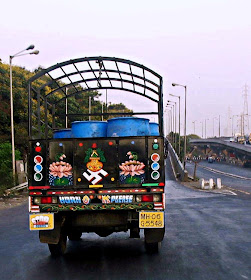 religious painting on back of truck