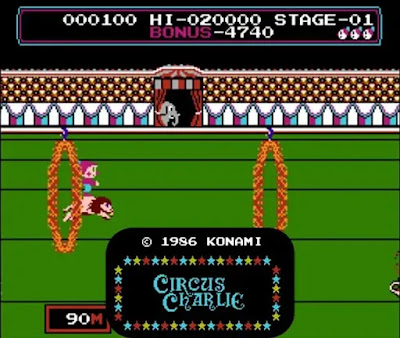 Circus Charlie - A pixelated arcade game screen showing a colorful circus tent. In the foreground, a happy clown named Charlie rides a unicycle across a tightrope, dodging mischievous monkeys.