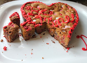 Food Lust People Love: Bake a Big Be Mine Heart Cookie for your sweetheart. A big M&M cookie cake baked in a heart pan and decorated with red sugar icing:  Be Mine!