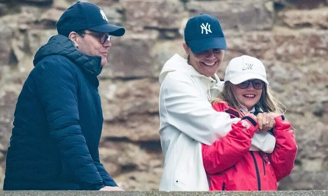 Crown Princess Victoria and Prince Daniel visited Linda Karlsson's (Miss Li) concert. Princess Estelle wore a red jacket by Musto