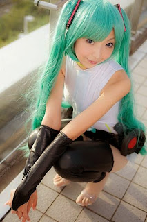 Necoco cosplay as Vocaloid Hatsune Miku