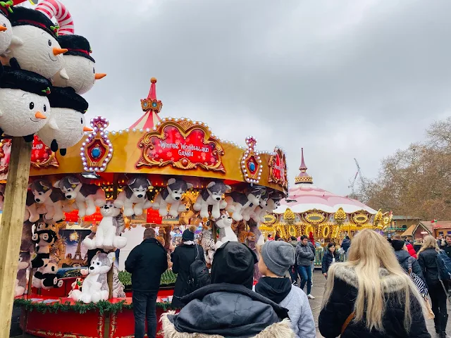 Fairground games at Winter Wonderland with giant teddy bear prizes