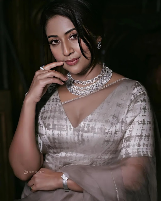 Navya Nair exudes elegance in her latest photoshoot, showcasing timeless beauty and style.