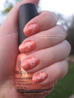 Peaches and cream floral and fishnet manicure