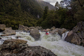 Gonzo reaching for a boof on the second major rapid of the Arthur River, NZ, whereisbaer
