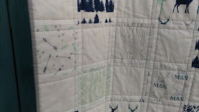 Woodland navy, aqua, gray baby quilt