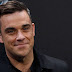Sok mindenétől megválik Robbie Williams