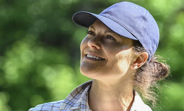 Crown Princess Victoria, with her dog Rio, visited Angso National Park. Victoria wore a checked shirt by Andiata