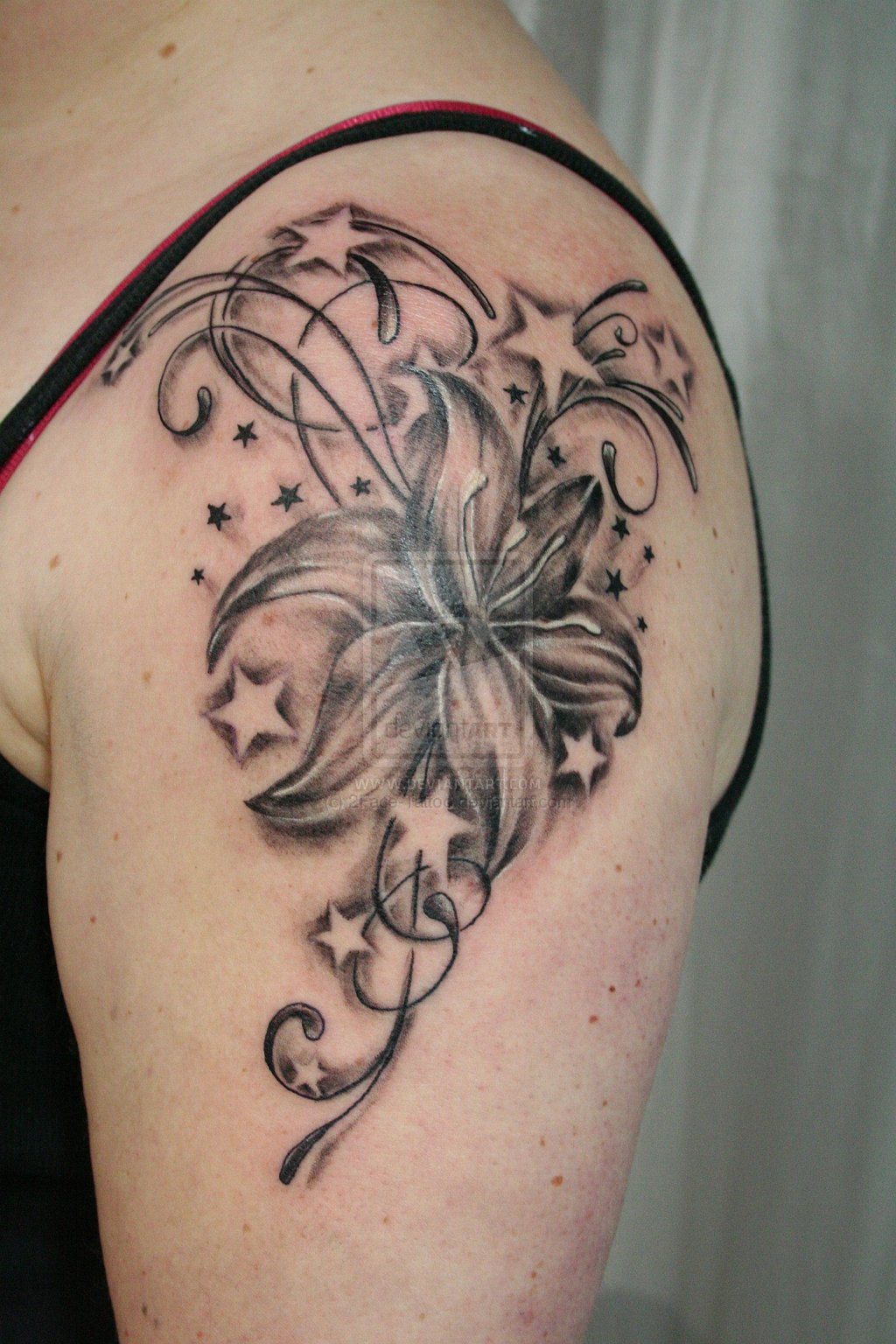 Flower and Star Tattoo Designs for Women