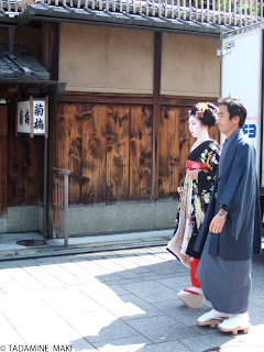 A maiko and a man in Gion, Kyoto